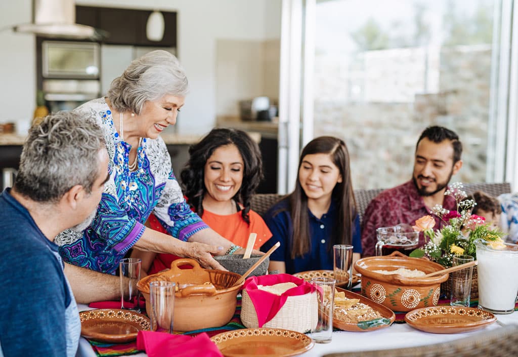 family having a meal together at dining table